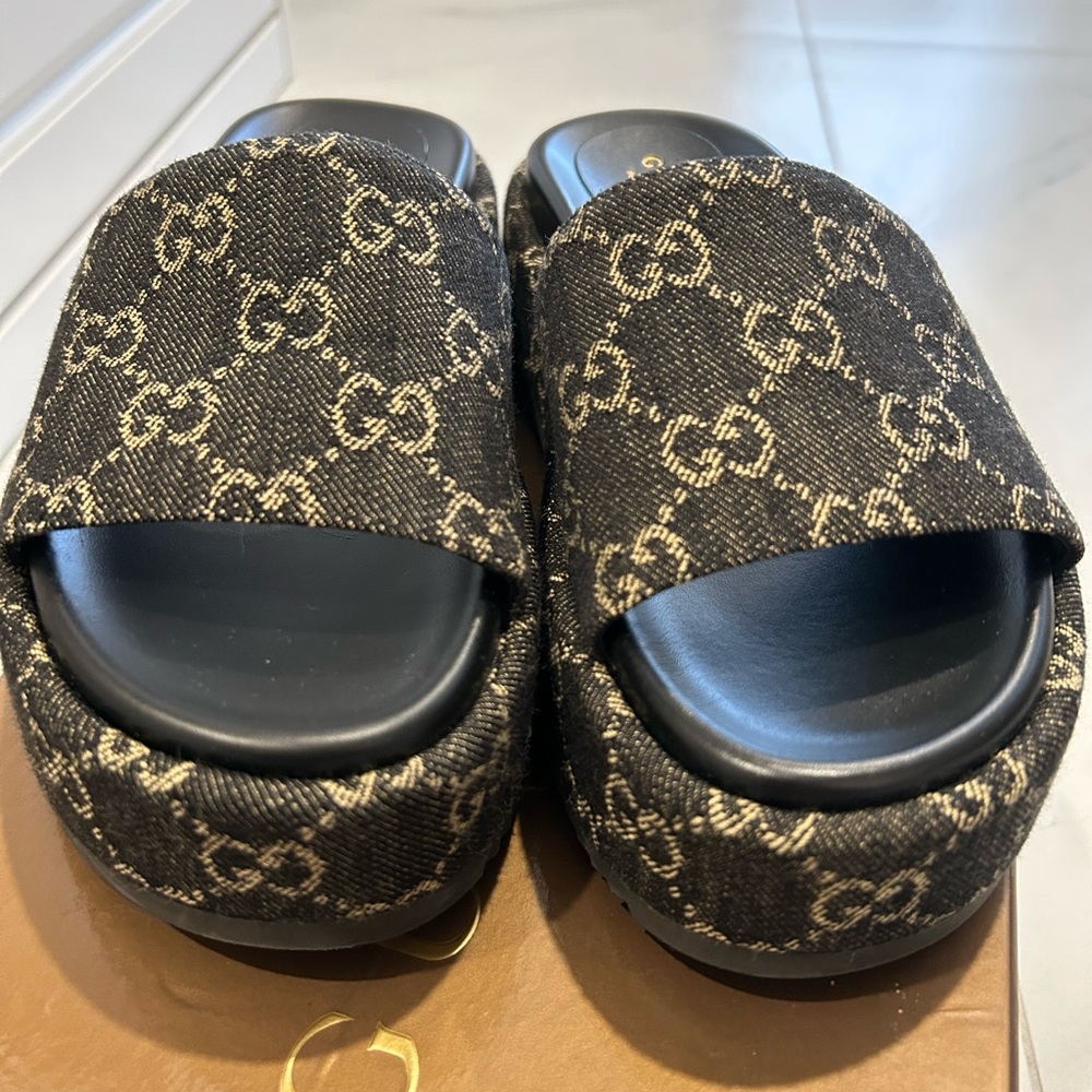Gucci Black and Gold Monogram Slides